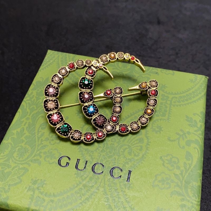 Gvc*1 brooches